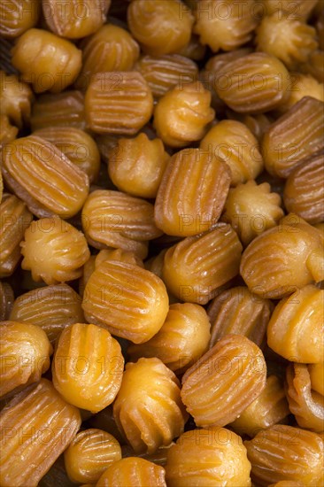 Deep-fried puff pastry dipped in syrup. In Turkish named as Tulumba tatlisi