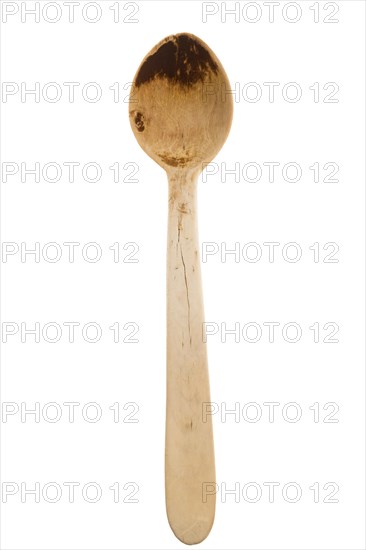 Boxwood wooden spoon against a white background