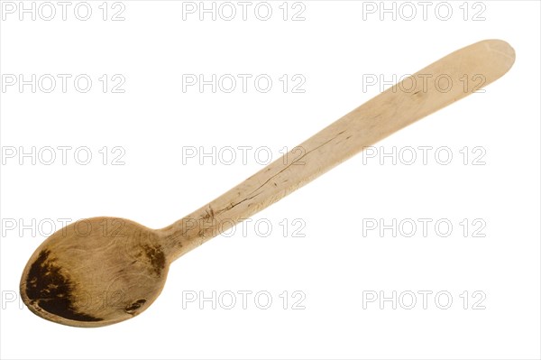 Boxwood wooden spoon against a white background