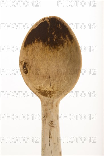 Boxwood wooden spoon against a white background