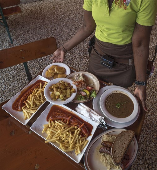 Food served on a tray in a beer garden