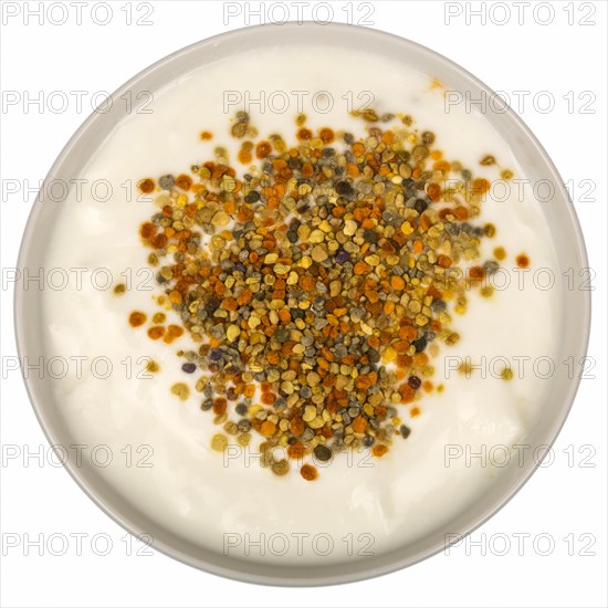 Fresh bee pollen from a cup of yoghurt