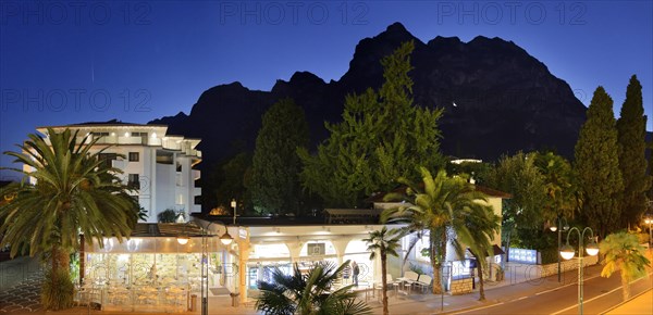 Viale Rovereto and Cina mountain range at sunset