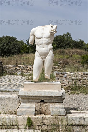 Collosal torso of a naked male god in the Hadrian's Bath of Aphrodisias in Aydin