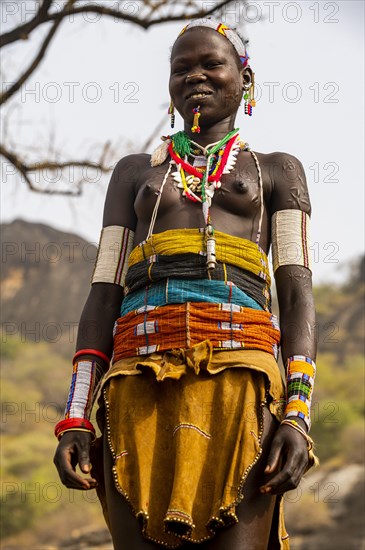 Traditional dressed young girl from the Laarim tribe