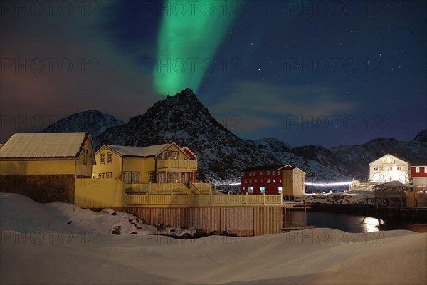 Snowy landscape with houses