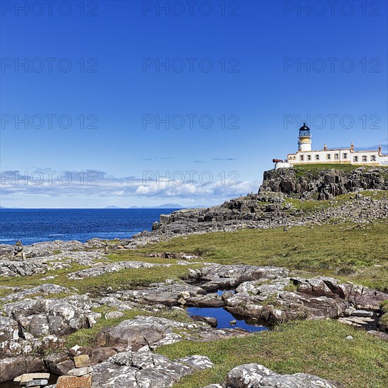 Lighthouse on rocky coast