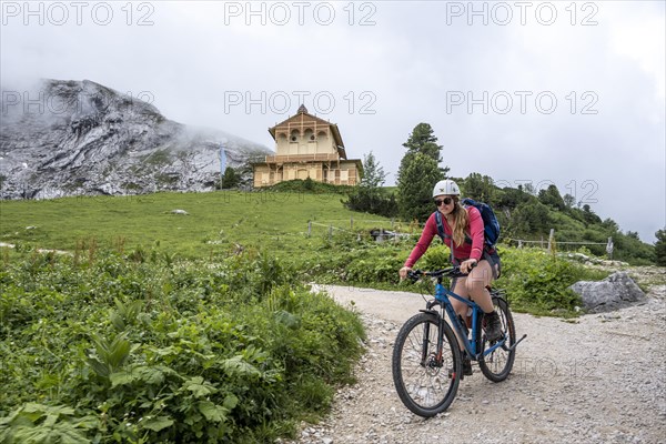 Mountain biker on a mountain bike descending from Schachenhaus