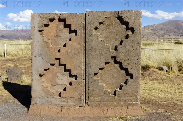 Stone block with Andean cross symbol