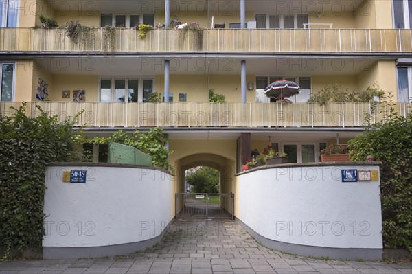 Balconies with plants and parasol