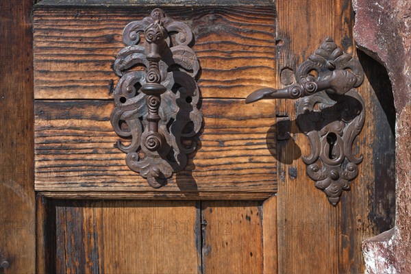 Old iron roof beacons at the gate of the chapel in the courtyard of Blutenburg Palace