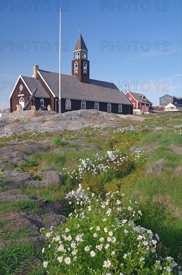 Flowers and Wooden Church