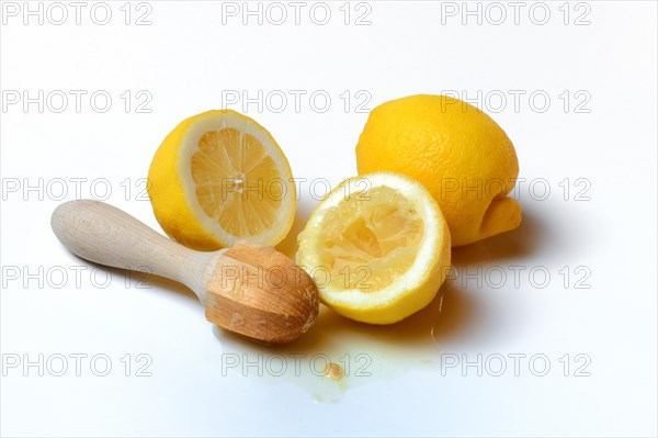 Lemons and lemon squeezer