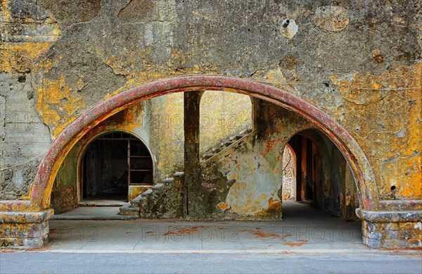 Entrance of a dilapidated arcaded building