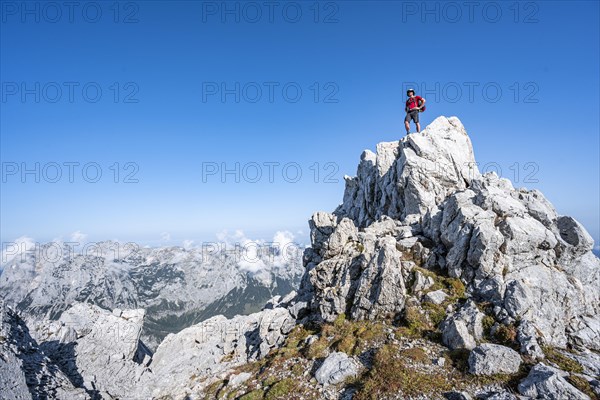 Hiker standing on a rock