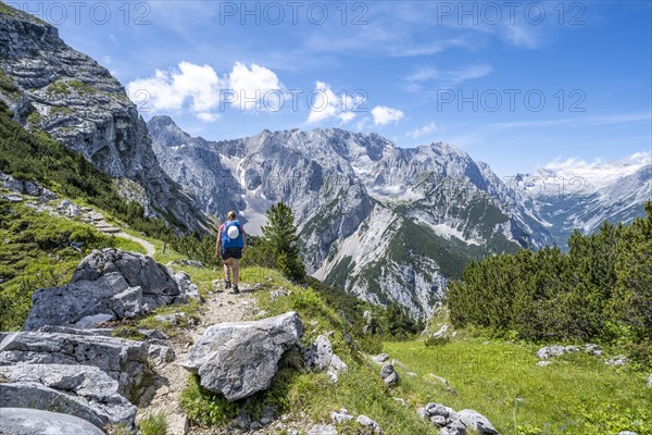 Hiker on the trail to the Meilerhuette