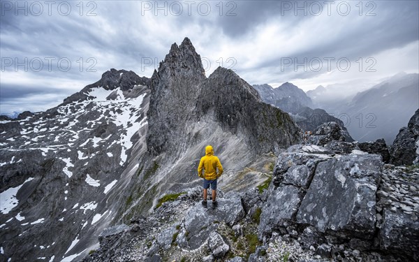 Hiker at the summit of the Westliche Toerlspitze