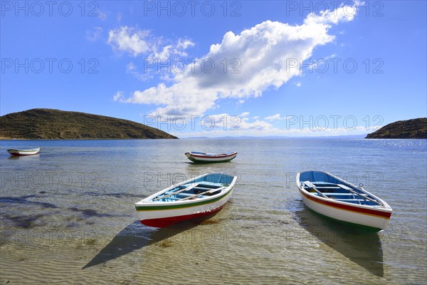 Fishing boats in the shallow waters of the beach