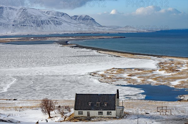 Abandoned house in front of wide bay