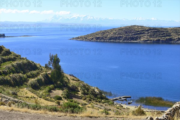 View across the lake to the Cordillera Real mountain range
