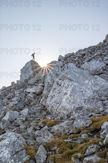 Hiker standing on a rock