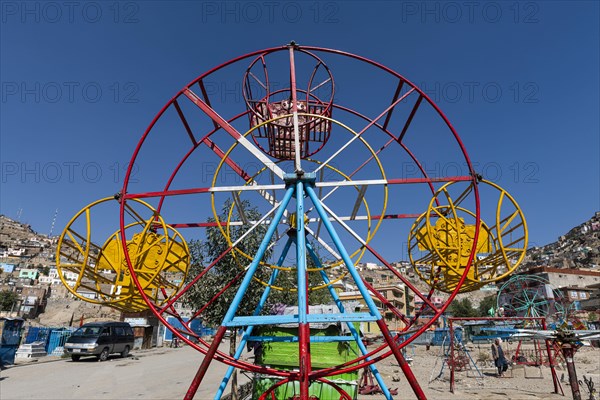 Old fashioned playground at the Sakhi Shah-e Mardan Shrine or Ziyarat-e Sakhi