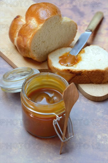 French caramel cream in glass and yeast plait