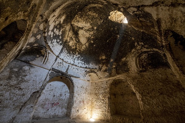 Cave system in the Takht-e Rostam stupa monastery complex