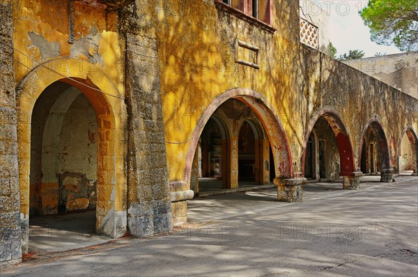 Dilapidated arcade building