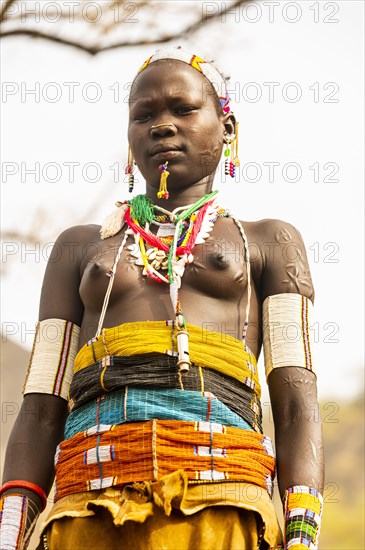 Traditional dressed young girl from the Laarim tribe