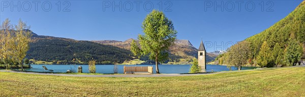 Church tower in Lake Reschen Panorama