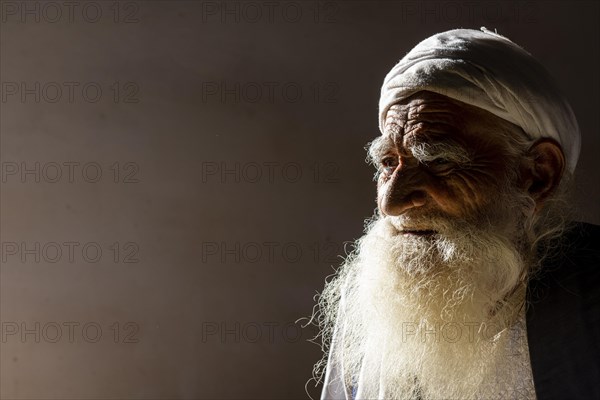 Sufi priest studying