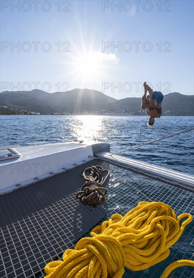 Young man does a somersault