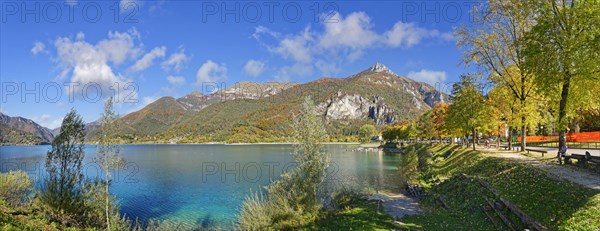 Turquoise lake in autumn vegetation