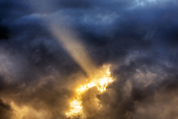 Sunbeam through gap in clouds