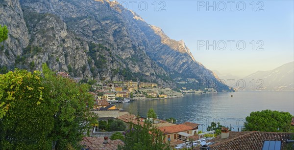 Idyllic fishing village on the western shore of Lake Garda in the evening