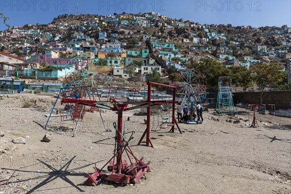 Old fashioned playground at the Sakhi Shah-e Mardan Shrine or Ziyarat-e Sakhi