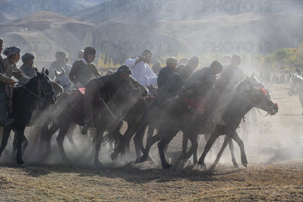 Men practising a traditional Buzkashi game