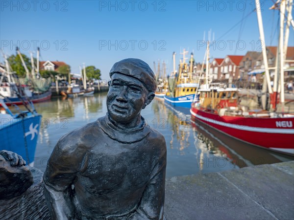 Bronze sculpture of a fisherman