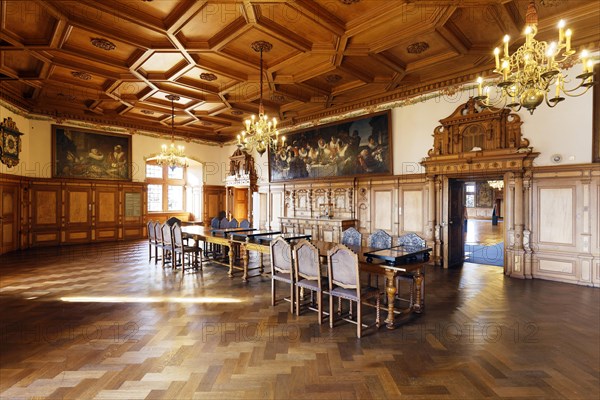 Dining room with wood panelling and coffered ceiling