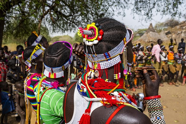 Traditional dressed young girls practising local dances