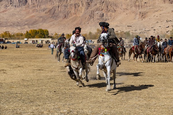 Men practising a traditional Buzkashi game