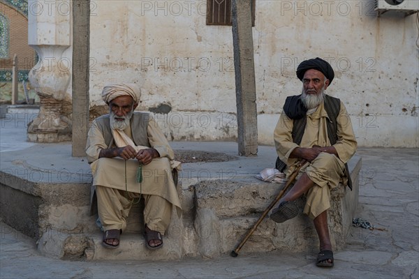Old men at the Ahmad Shah Durrani mausoleum