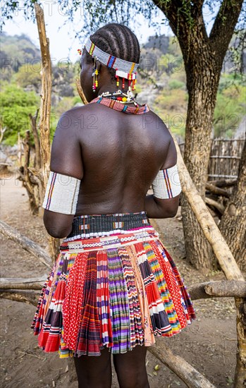 Traditional dressed young girl from the Laarim tribe