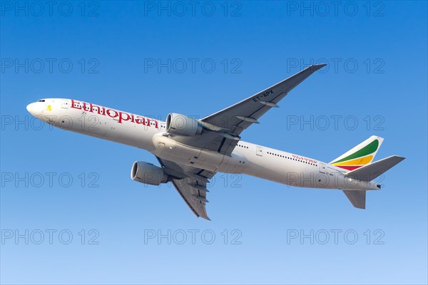 A Boeing 777-300ER aircraft of Ethiopian Airlines with registration number ET-APX takes off from Dubai Airport