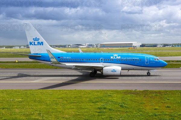 A KLM Royal Dutch Airlines Boeing 737-700 aircraft with registration PH-BGU at Amsterdam Schiphol Airport
