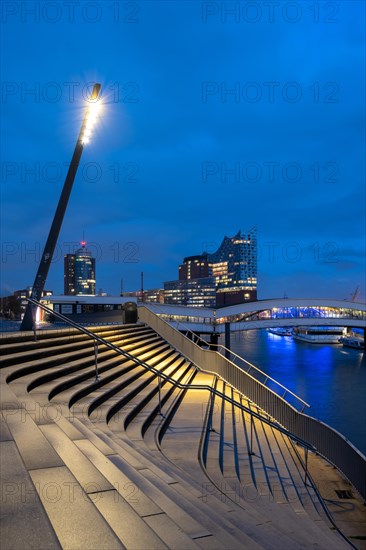 Landungsbruecken at Ueberseebruecke with Elbe Philharmonic Hall in the background