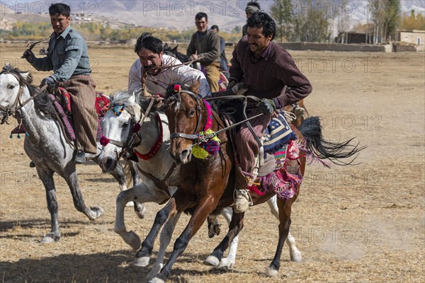 Men practising a traditional Buzkashi game