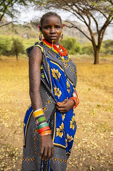 Traditional dressed young girl from the Laarim tribe