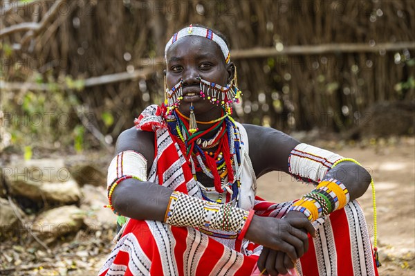 Traditional dressed young girl from the Laarim tribe